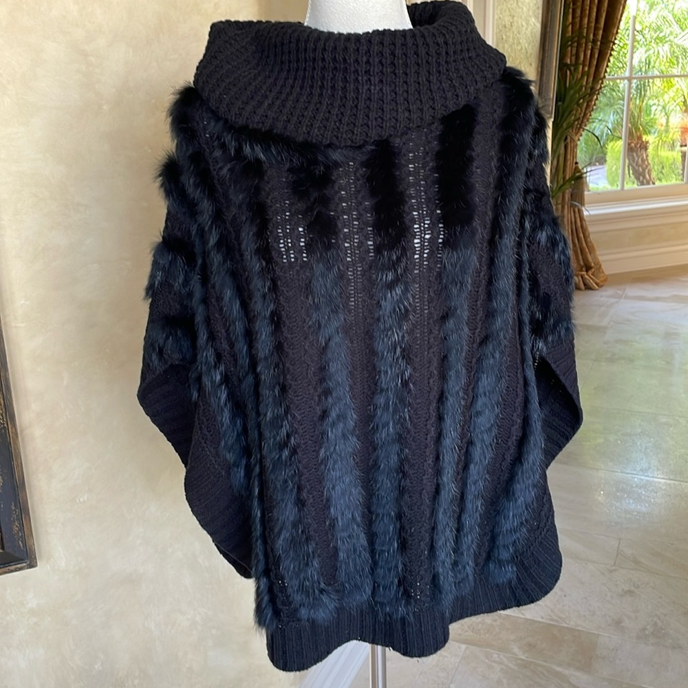 Black poncho style knit and fur sweater
